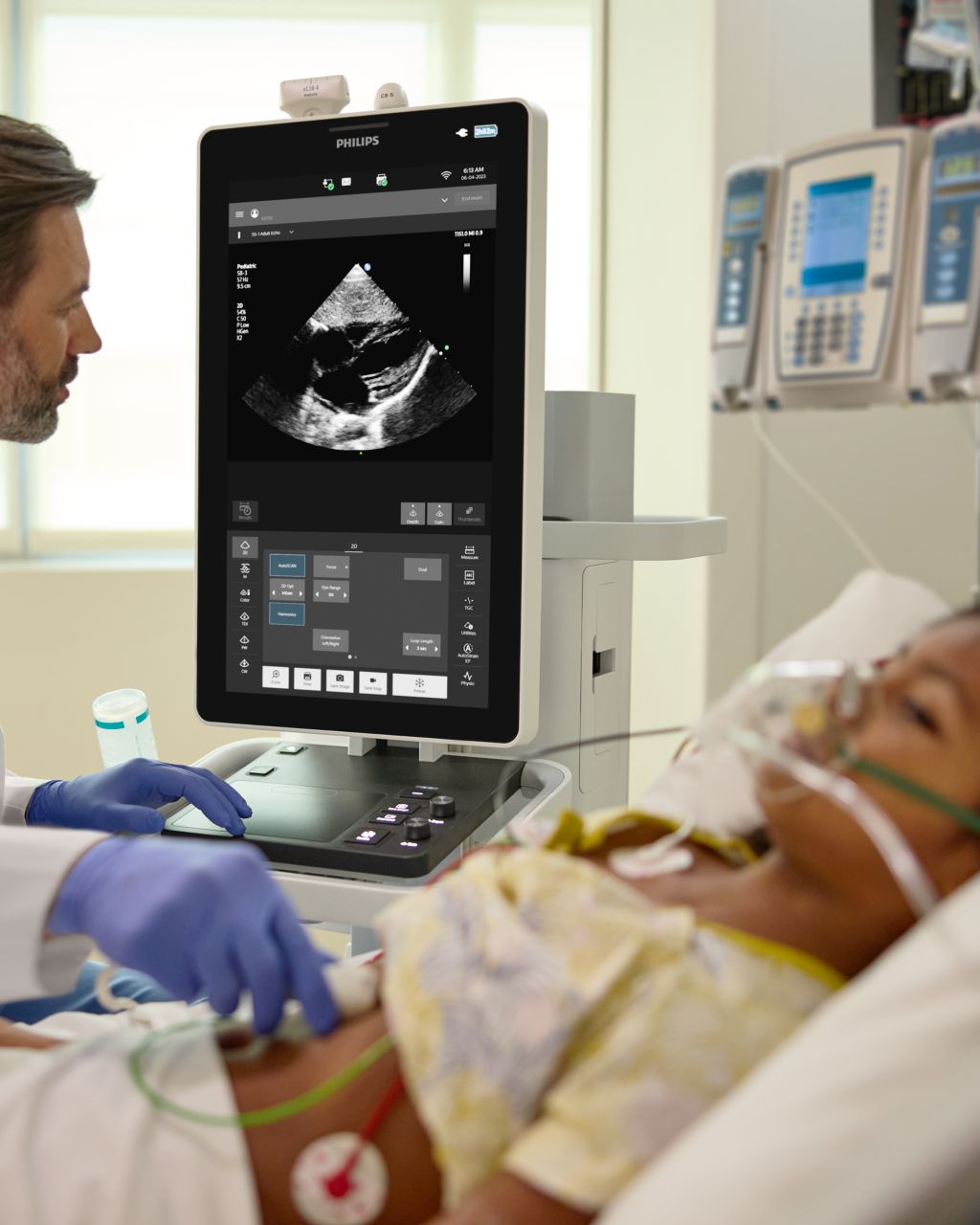 POC clinician performing TEE scan on adult patient.