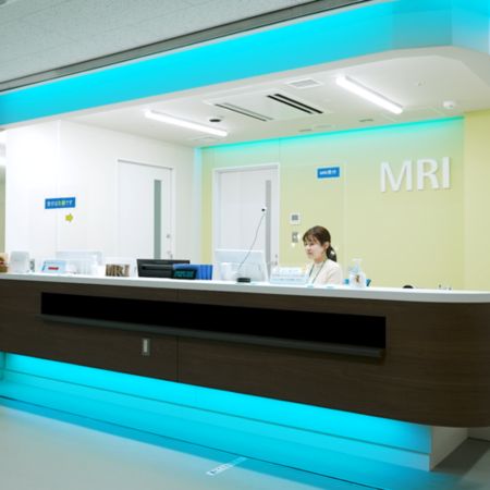 Undergoing an MRI exam while watching an Ambient Experience theme