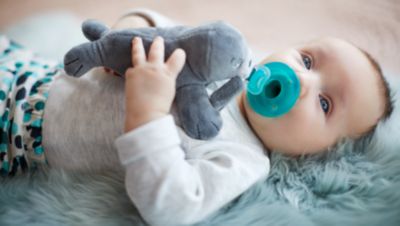 Snuggle pacifier holder, baby’s first friend