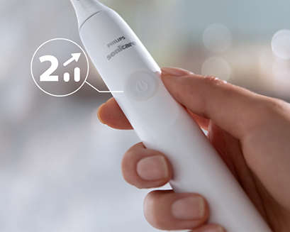 Closeup of hand holding a Sonicare 2300 handle