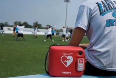 Philips HeartStart AED placed near sports field for emergency preparedness