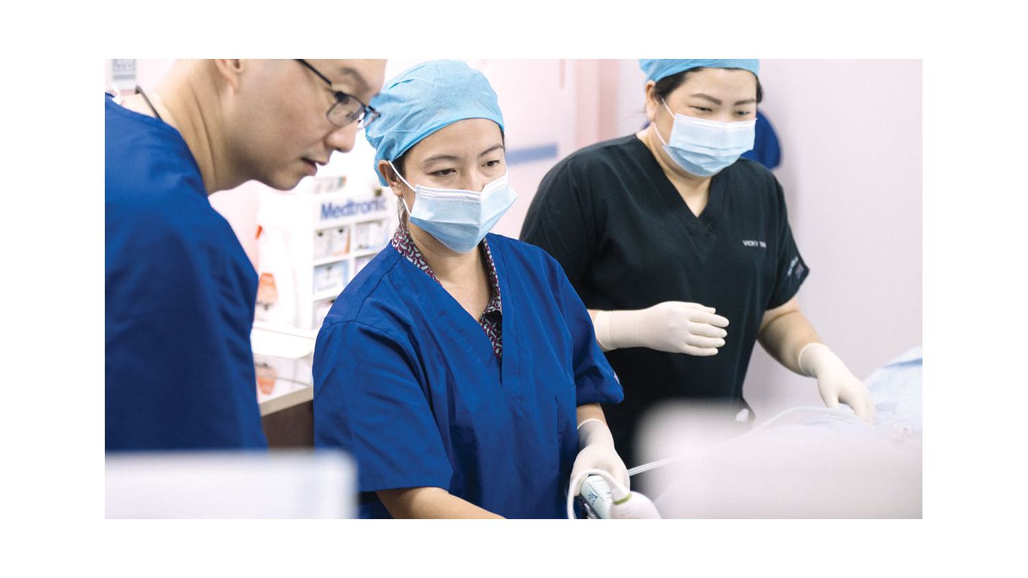 Clinicians using Lumify during breast procedure