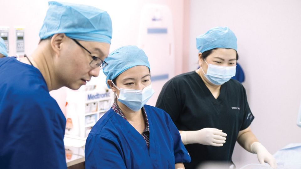 Clinicians using Lumify during breast procedure