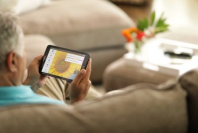 Patient with remote monitoring solution at home