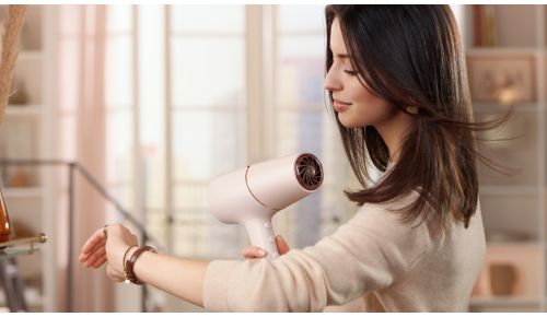 Asciugatura più veloce del 20%*** con un getto d'aria potente da 2300 W