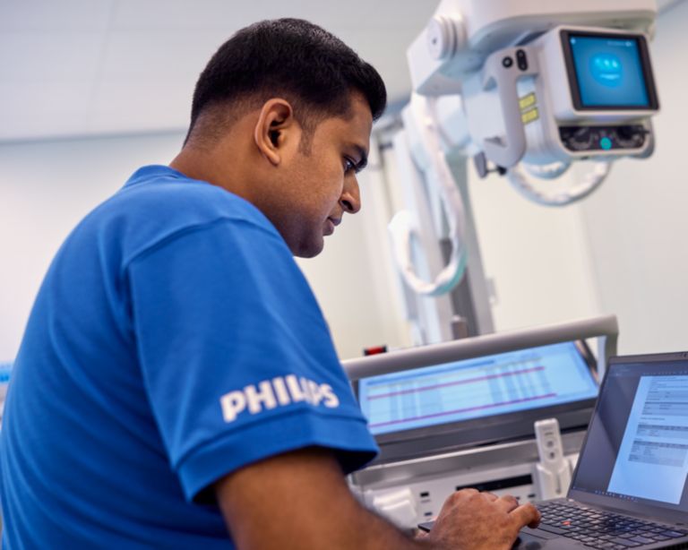 Philips tech servicing a digital x-ray