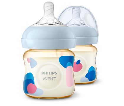 Premium Photo  Washing baby bottles and nipples with soft bottle