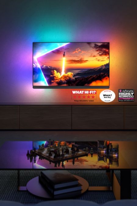 Philips OLED 910 Ambilight TV lighting the wall with vibrant colors in a living room