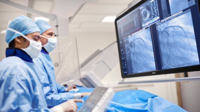 Clinicians using Philips Azurion with ClarityIQ for image-guided procedure