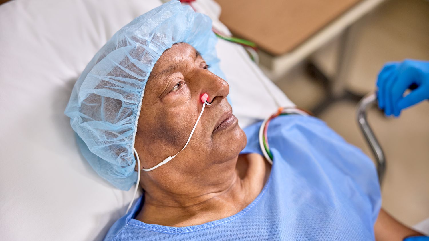 patient wearing the Nasal Alar SpO2 sensor