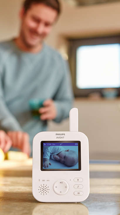 A baby is being watched via a tablet