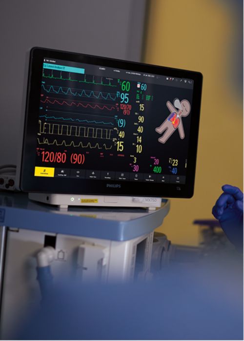 Anesthesiologist looking at monitor