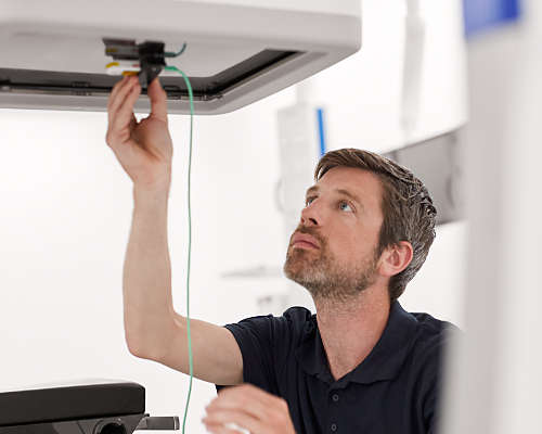 Technician preparing the device for testing