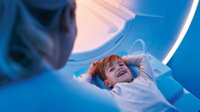 Child patient undergoing MRI scan in ambient environment