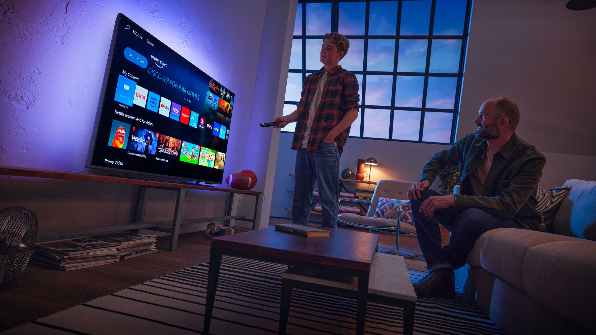 Two men interact with a Titan OS