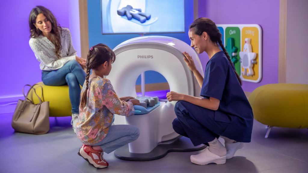 The Pediatric Coaching solution_Mother, nurse and girl with Kitten Scanner sliding in Ollie