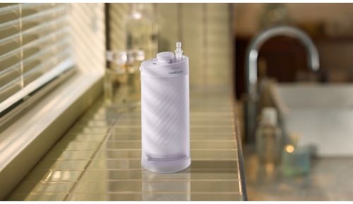 Komora 2 w 1 do przechowywania nasadek i otwór do napełniania