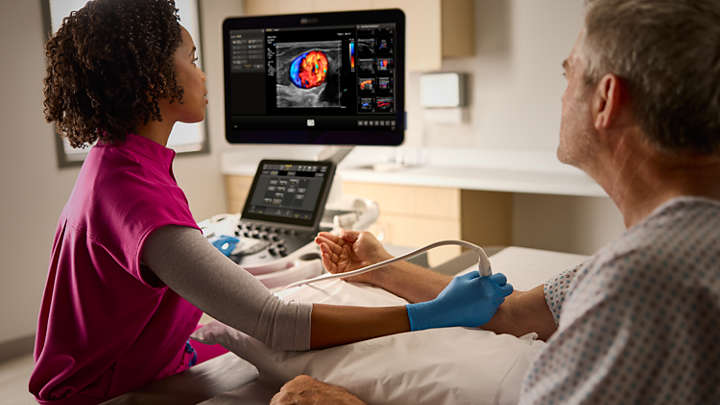 Doctor checking performance in vascular ultrasound