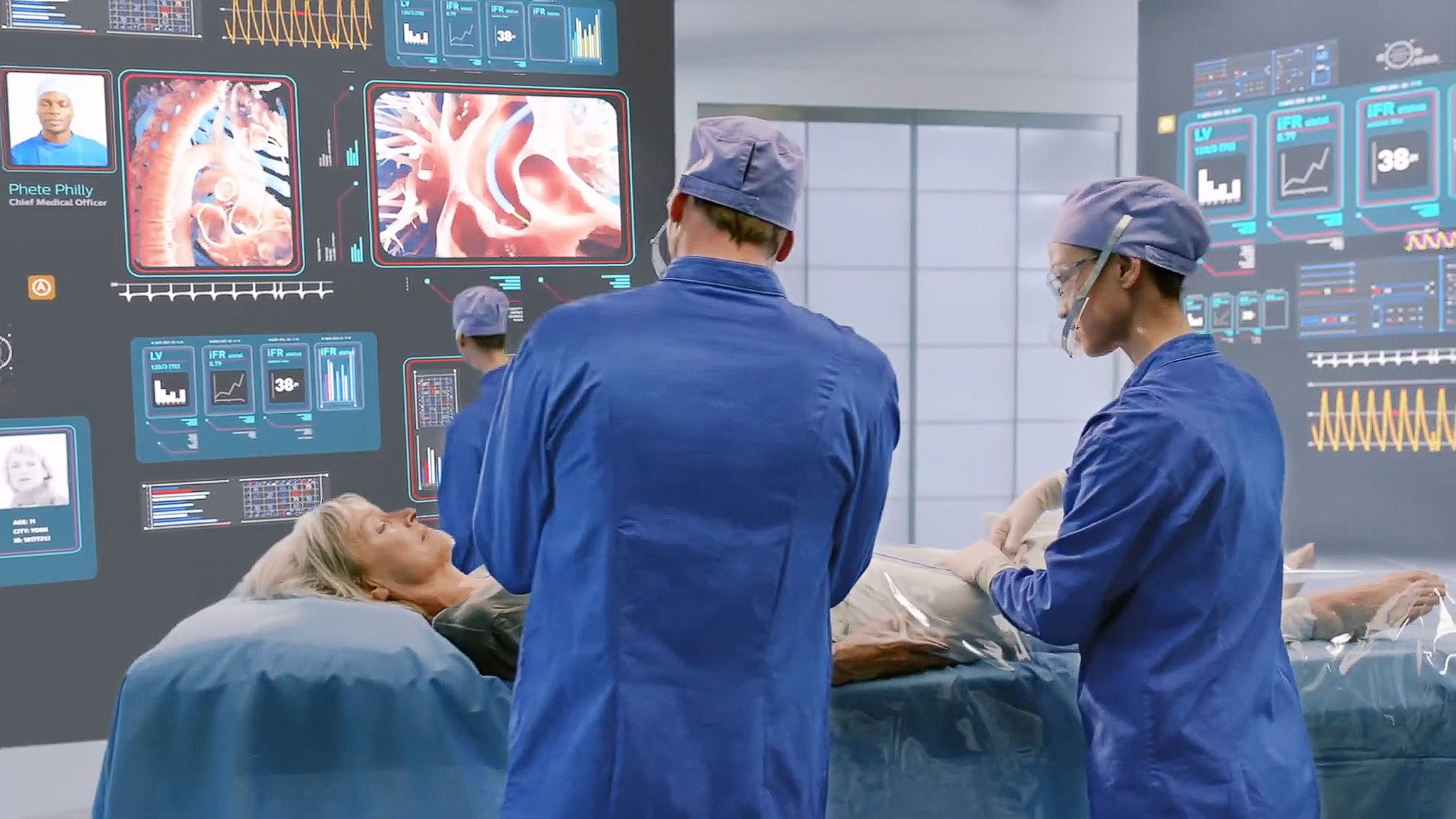 Clínicos utilizando visualização avançada de terapia guiada por imagem em um laboratório do futuro