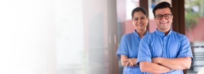 Healthcare staff in blue uniform