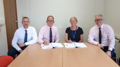 Representatives from County Durham and Darlington NHS Foundation Trust and Philips signing a 14-year partnership agreement to enhance radiology and cardiology services