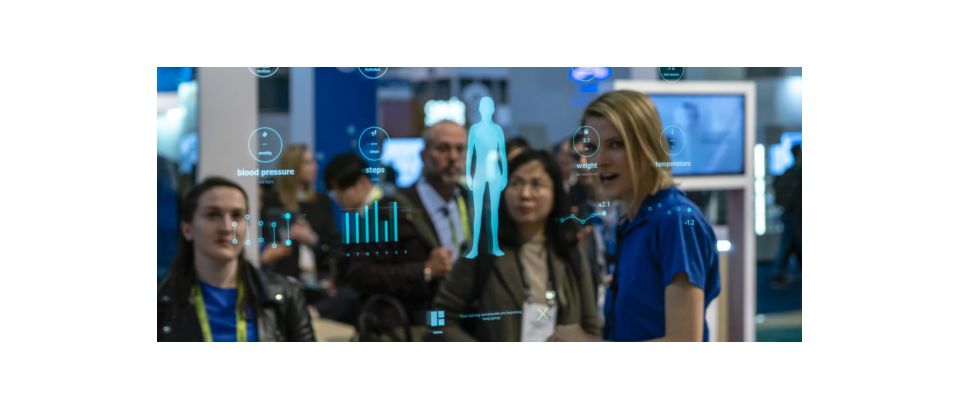 People discussing over a glass board