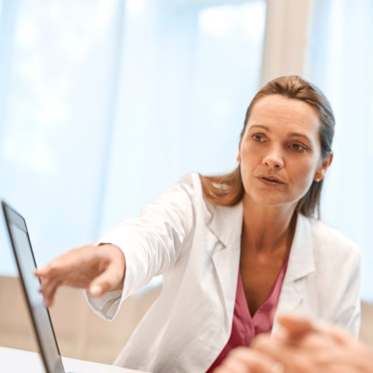 Clinicians consult with partners