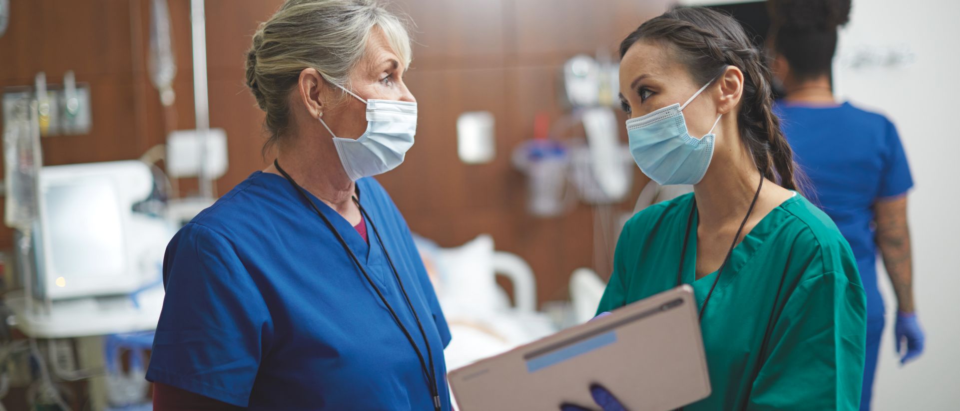 Nurse/Doctor conferring with tablet