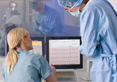 Medical Professionals Monitoring Patient