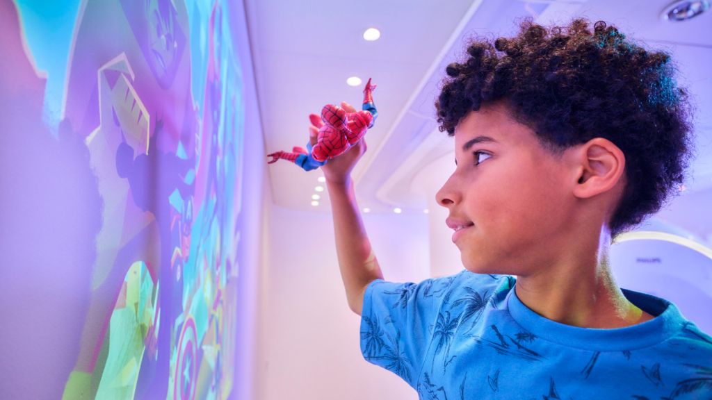 Boy with Spiderman playing with Disney Spiderman theme for Ambient Experience for MR