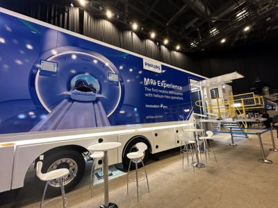 Exterior of Philips mobile MRI unit with BlueSeal helium-free technology displayed at UK Imaging and Oncology Congress 2024