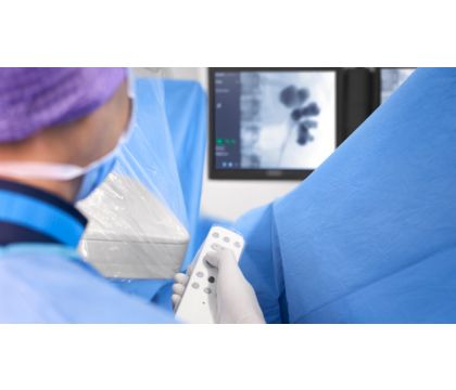 Surgical team performing urology case with Zenition FD mobile C-arm
