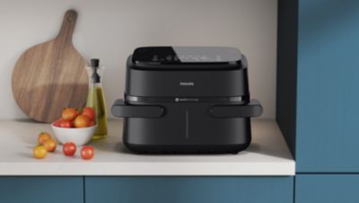 Airfryer with flexible basket on kitchen counter