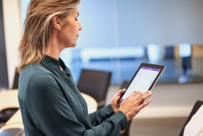 Pathologist reviewing digital slides on tablet