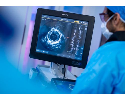 Clinician looking at Intrasight Mobile