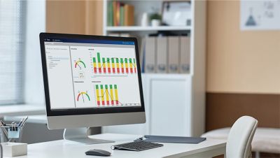 Desktop computer displaying Philips Tasy analytics dashboard