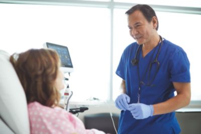 Doctor talking with patient