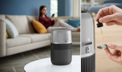 Philips Luftbefeuchter im Wohnzimmer, dem Aromaöl hinzugefügt wird