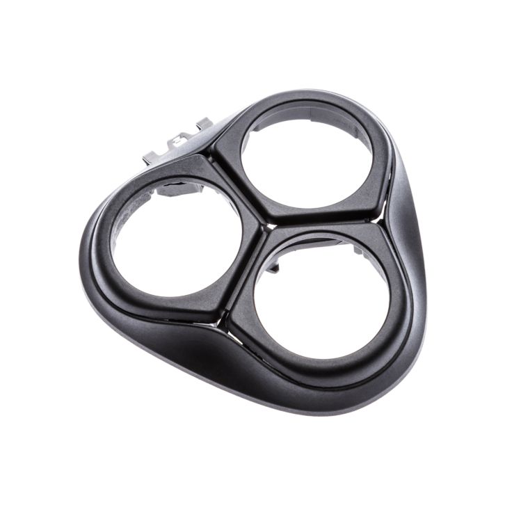 Keeps shaving heads in position