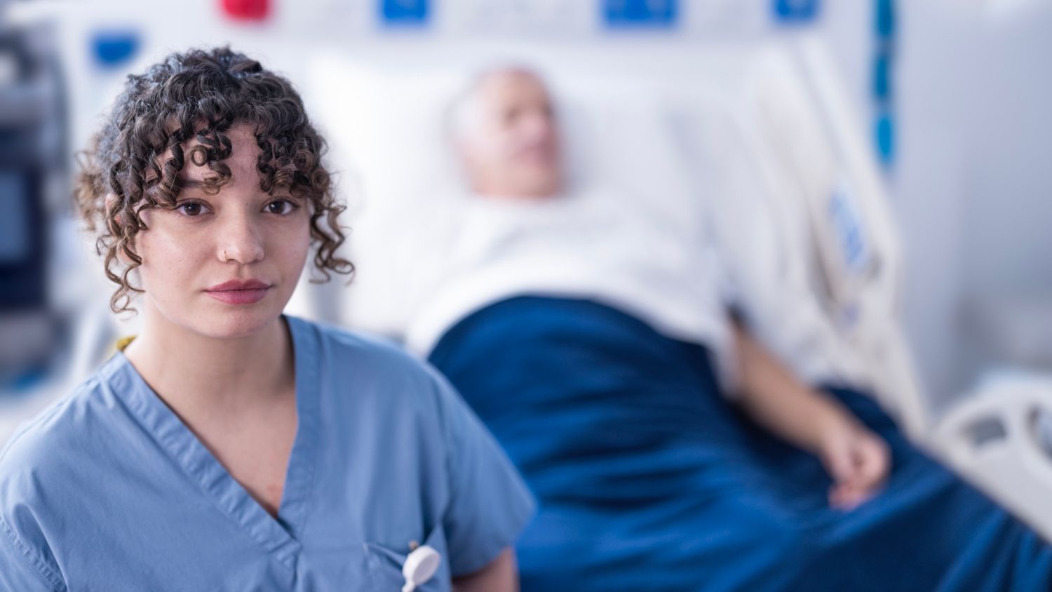 Bedside and virtual nurse provide care to patient