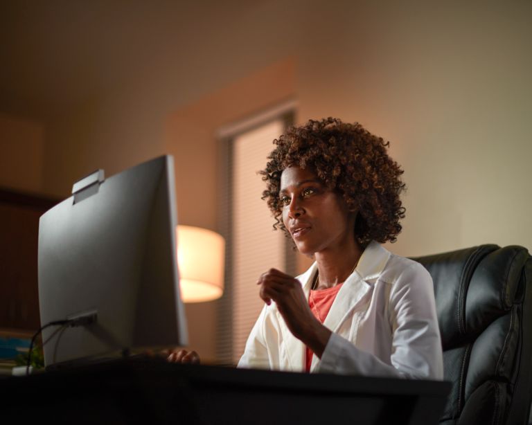 Woman using remote collaboration software