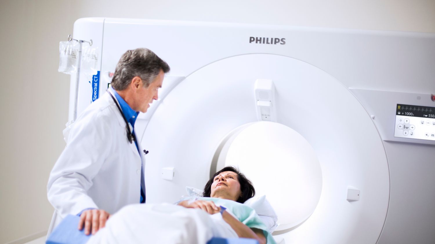 Patient and clinician during CT scan