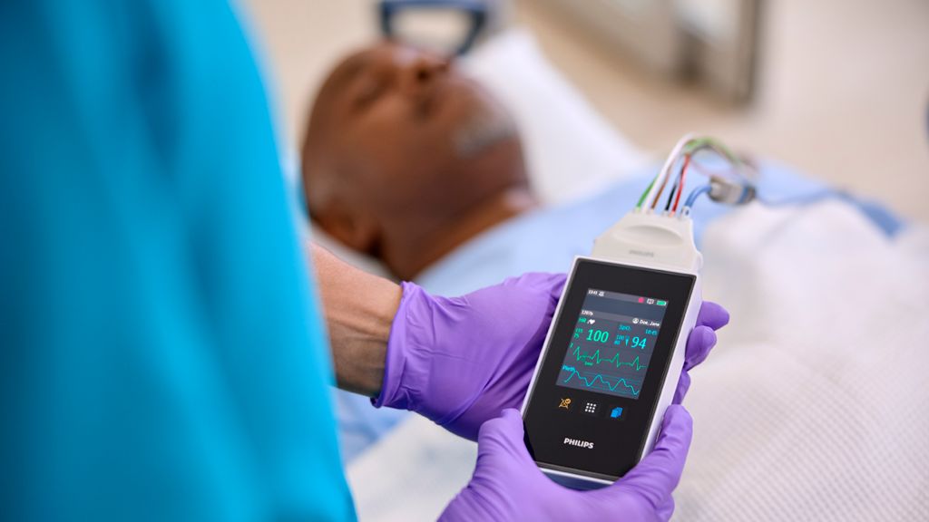 Clinician viewing telemetry data at the bedside on the Telemetry Monitor 5500