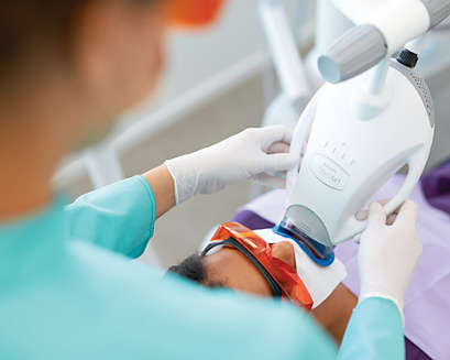 A patient undergoing a Philips Zoom! WhiteSpeed treatment