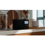 Splash-proof portable radio for home and garden