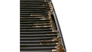 Sloped grill to drain excess fat away