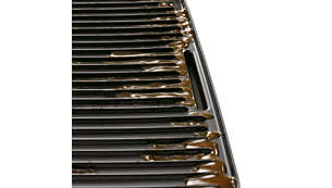 Sloped grill to drain excess fat away