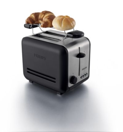 Iekļauts sildošais statīvs maizīšu un kruasānu sildīšanai