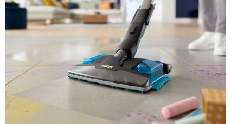 Aqua nozzle vacuums and wet wipes in one go