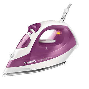 Steam iron with non-stick soleplate